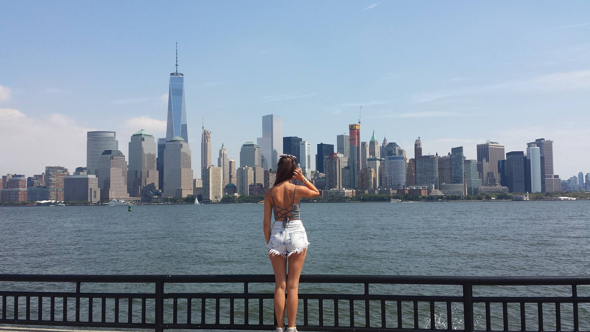Portrait of Carly looking at New York City skyline